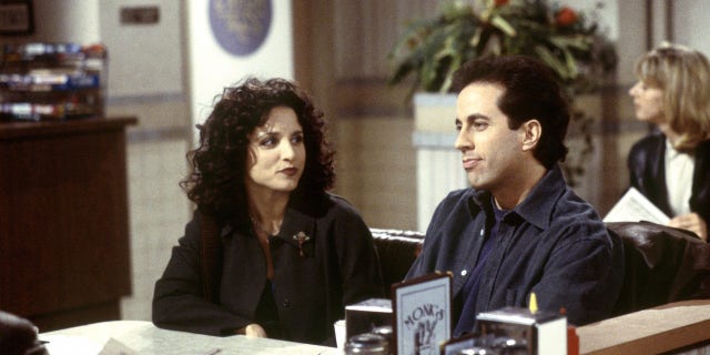 Julia Louis-Dreyfus, left, as Elaine Benes and Jerry Seinfeld, right, as himself on "Seinfeld."