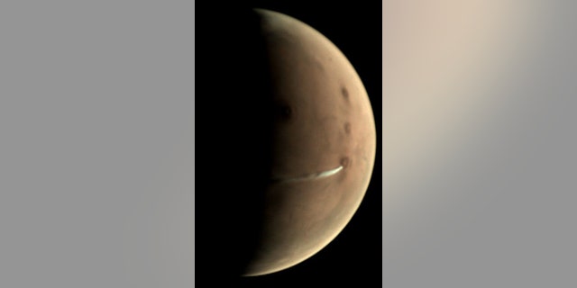 Since 13 September 2018, the Visual Monitoring Camera (VMC) on board ESA’s Mars Express has been observing the evolution of a curious cloud formation that appears regularly in the vicinity of the 20 km-high Arsia Mons volcano, close to the planet’s equator. (Credit: ESA/GCP/UPV/EHU Bilbao, CC BY-SA 3.0 IGO)