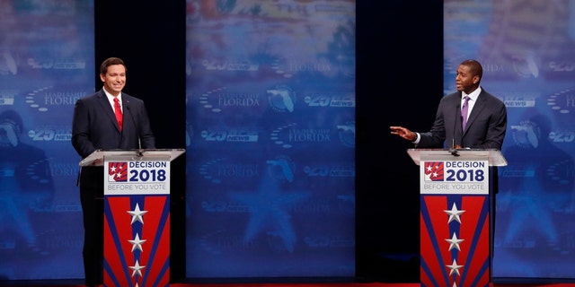 Florida gubernatorial candidates, Republican Ron DeSantis, left, and Democrat Andrew Gillum debate, Wednesday, Oct. 24, 2018, at Broward College in Davie, Fla. (AP Photo/Wilfredo Lee, Pool)
