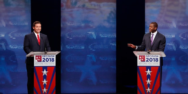 Florida gubernatorial candidates, Republican Ron DeSantis, left, and Democrat Andrew Gillum debate, Wednesday, Oct. 24, 2018, at Broward College in Davie, Fla. (AP Photo/Wilfredo Lee, Pool)