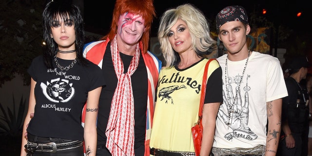 Kaia Gerber, Rande Gerber, Cindy Crawford and Presley Gerber attend the Casamigos Halloween Party on October 26, 2018, in Beverly Hills dressed as famous rock stars. (Photo by Michael Kovac/Getty Images for Casamigos)