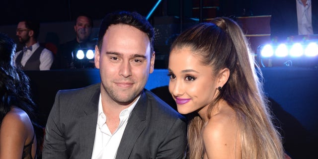 Scooter Braun said he was fired by Ariana Grande while she was dating "s---ty boyfriends."