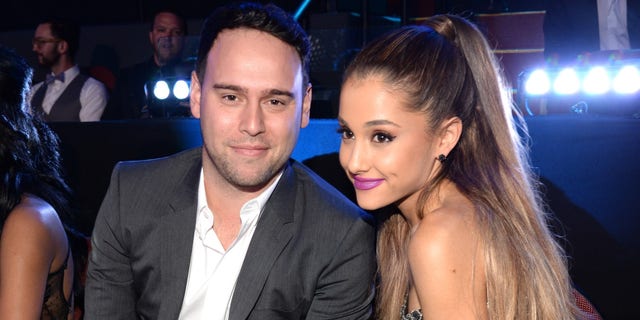 Scooter Braun said he was fired by Ariana Grande while she was dating "s---ty boyfriends."