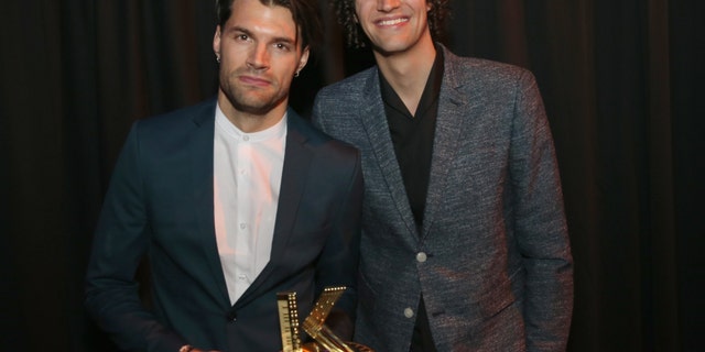 Joel David Smallbone and Luke James Smallbone of For King and Country pose with award at the 4th Annual KLOVE Fan Awards at The Grand Ole Opry House on June 5, 2016 in Nashville, Tennessee.