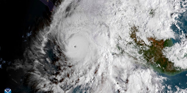 This GOES East satellite image provided by NOAA shows Hurricane Willa in the eastern Pacific, on a path toward Mexico's Pacific coast on Monday, Oct. 22, 2018. (NOAA via AP)