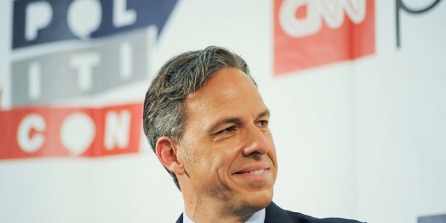 CNN anchor Jake Tapper is under fire for staying quiet when a guest said Trump has radicalized more people than ISIS. REUTERS/Andrew Cullen - RC1A748E0440