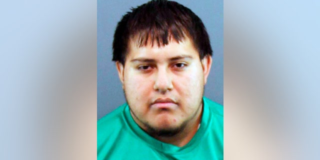 This Monday, Oct. 29, 2018, booking photo provided by the Peoria County Jail in Illinois shows Jose Ramirez, who was charged Monday with first-degree murder after he confessed to killing his parents, Susan Brill de Ramirez and Antonio Ramirez Barron, who have been missing since the weekend. (Peoria County Jail via AP)