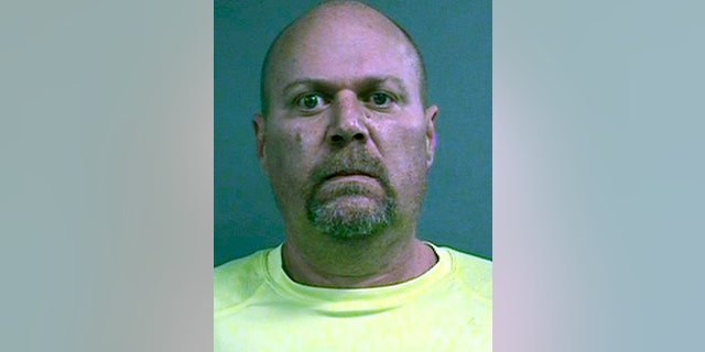 This photo provided by Louisville Metro Department of Corrections shows Gregory Alan Bush, who was booked early Thursday, Oct. 25, 2018, on two counts of murder and 10 counts of felony wanton endangerment, according to Louisville Metro Detention Center records. (Louisville Metro Department of Corrections via AP)