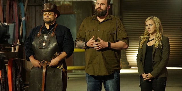 Trent, Zeke and Ashley address contestants on Discovery's "Master of Arms.'