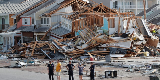 Rescue crews perform a search in the aftermath of Hurricane Michael in Mexico Beach, Fla., Thursday.