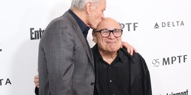 Michael Douglas, left, and Danny DeVito arrive at the 5th Annual Reel Stories, Real Lives Benefiting MPTF held at Milk Studios on April 7, 2016 in Los Angeles, California. (Photo by Michael Tran/FilmMagic)