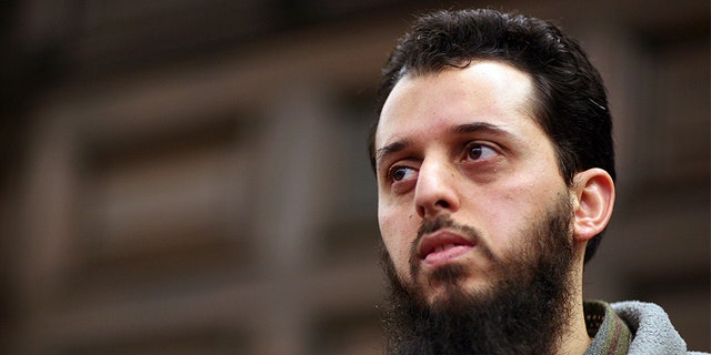 Moroccan Mounir el-Motassadeq waits before his trial in a court in Hamburg.