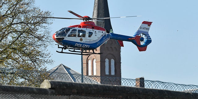 A helicopter carrying Mounir el-Motassadeq takes off from Hamburg prison.