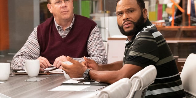 Peter Mackenzie, left, discusses his character's consistently oblivious racial remarks on ABC’s “black-ish.”