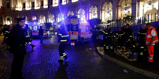 An injured person is seen outside the underground where some of CSKA Moscow supporters were injured in Rome, Italy, October 23, 2018.
