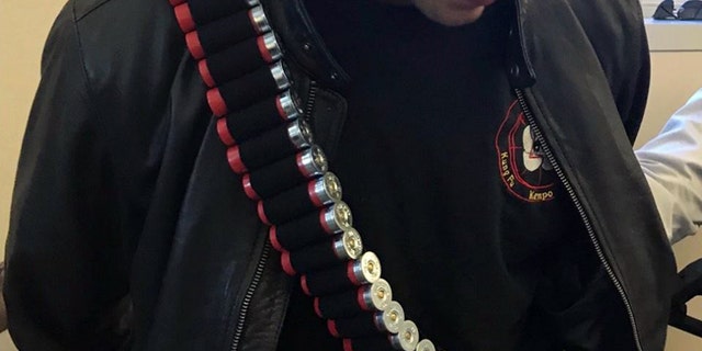 A 20-year-old junior at the University of Central Florida was detained by police on Tuesday after he wore "real ammunition" as part of his Halloween costume, officials said.