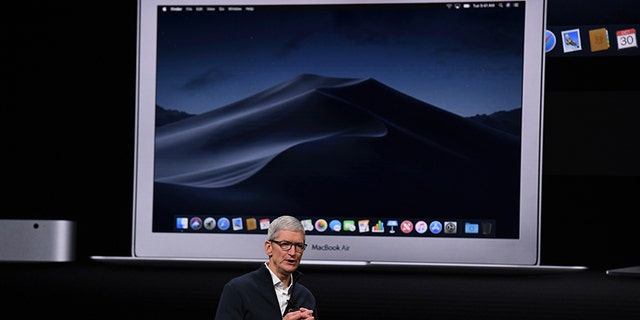 Apple CEO Tim Cook presents new products, including new Macbook laptops, during a special event at the Brooklyn Academy of Music, Howard Gilman Opera House October 30, 2018, in New York. (Photo by TIMOTHY A. CLARY / AFP) (Photo credit should read TIMOTHY A. CLARY/AFP/Getty Images)