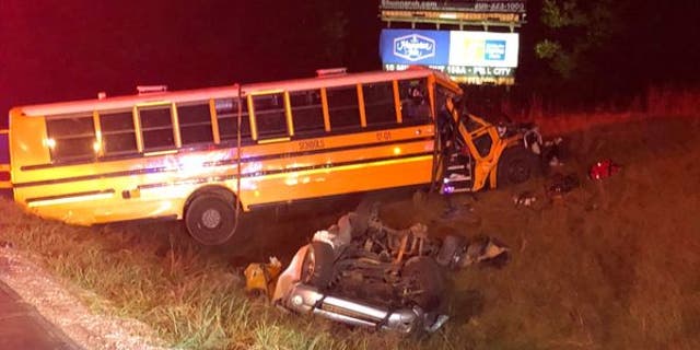 One person died, and 11 others were injured Tuesday night when a truck collided with a school bus full of kids on an interstate in Alabama.