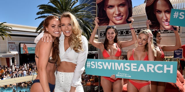 Models Haley Kalil (L) and Camille Kostek (2nd L) attend Sports Illustrated Swimsuit new issue launch and model search winners celebration at Encore Beach Club in Wynn Las Vegas on March 24, 2018, in Las Vegas, Nevada.  