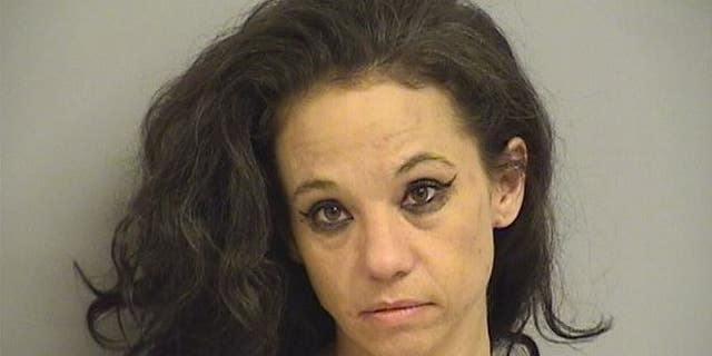 Angie Frost, 37, was captured on body camera stealing a police cruiser.