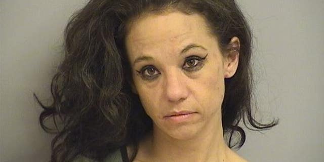 Angie Frost, 37, was captured on body camera stealing a police cruiser.