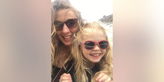 Coco Bradford, 6, who died from sepsis at the Royal Cornwall Hospital on July 31, 2017, is pictured with her mother, Rachel Bradford. 