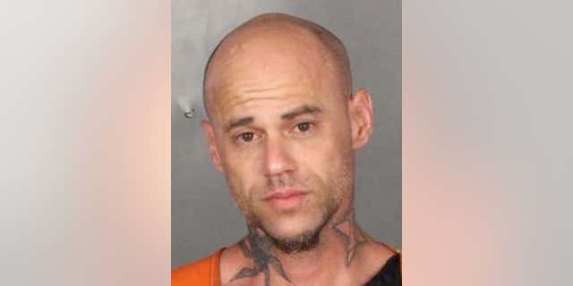John Wayne Morris, 37, faces charges of burglary with an intent to commit a sexual assault, reports said.