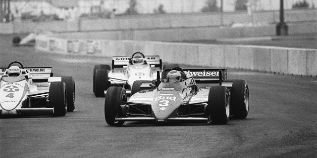 Race winner Mario Andretti leading the field at the 1984 Meadowlands Grand Prix.