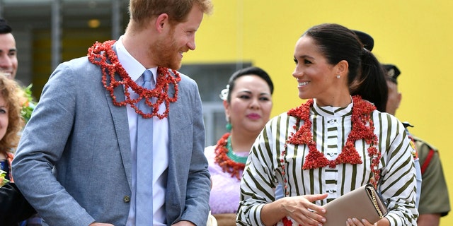 The Duke and Duchess of Sussex visit an exhibition of Tongan handicrafts, mats and tapa cloths at the Fa'onelua Convention Centre in Nuku'alofa, Tonga, Friday, Oct. 26, 2018.
