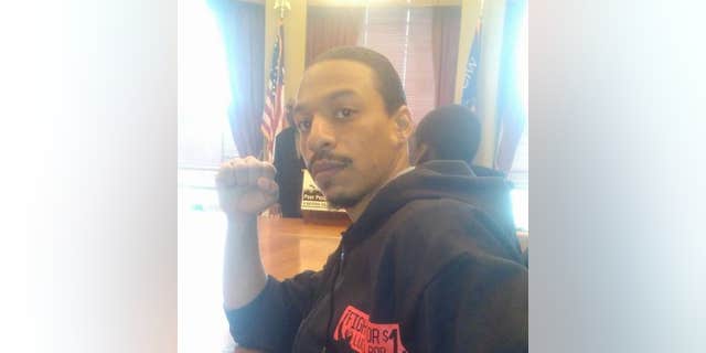 Solo Littlejohn, a Chicago-based progressive activist and hip hop artist.