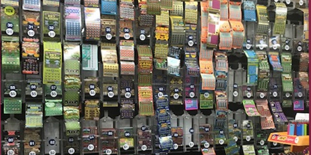 The Station Grocery, a favorite spot in East Boston, offers a wall full of different lottery options.