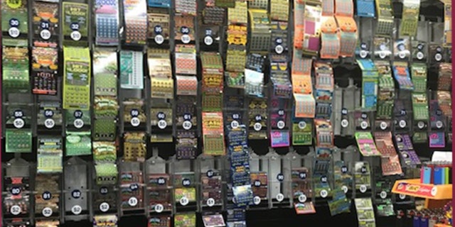 The Station Grocery, a favorite spot in East Boston, offers a wall full of different lottery options.