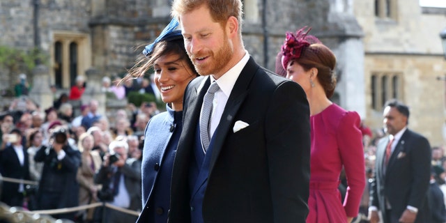 Britain's Prince Harry and Meghan Duchess of Sussex leave after the wedding of Princess Eugenie to Jack Brooksbank.