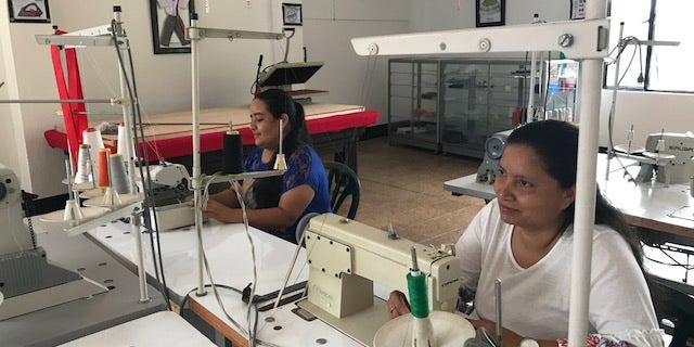 Mothers Diana Gualteros, 33 and Lucelly Foreno, 44 have taken advantage of the emerald mining resurgence to start their own sewing shop