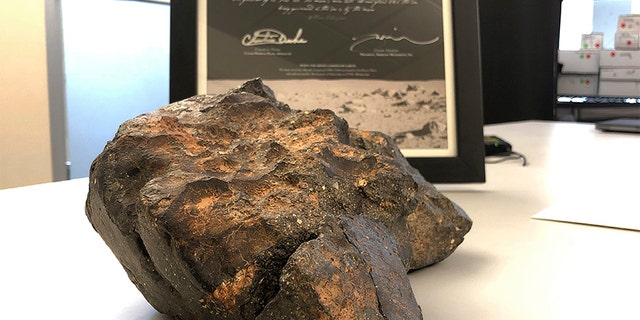 The 12-pound lunar meteorite was discovered in Northwest Africa in 2017, the auction house said.