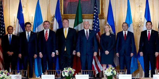From left; Vice President Oscar Ortiz of El Salvador, Honduran President Juan Orlando Hernandez, Mexico Foreign Secretary Luis Videgaray, U.S. Secretary of State Mike Pompeo, Vice President Mike Pence, Secretary of Homeland Security Kirstjen Nielsen, Mexico Secretary of Government Alfonso Navarrete and Guatemalan President Jimmy Morales pose for a photos before the second Conference for Prosperity and Security in Central America at State Department on Thursday.