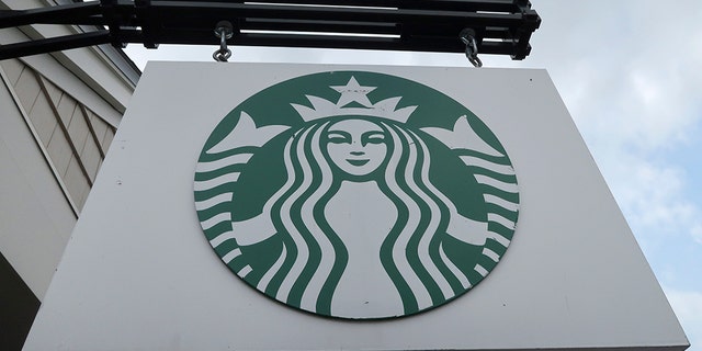 A Starbucks sign hangs in front of a store in Central Valley, N.Y., on Aug. 26, 2018. (Getty Images)