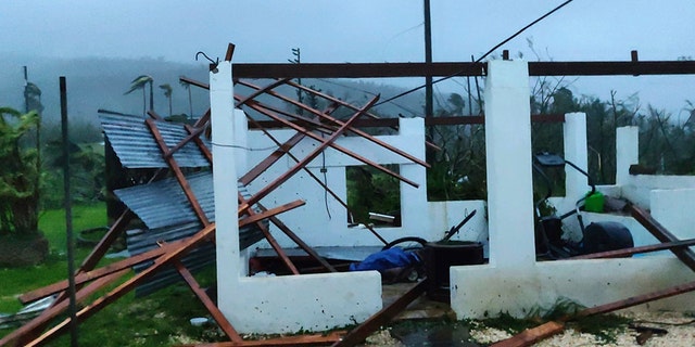 Damage from Super Typhoon Yutu is shown outside Glen Hunter's home in Saipan, Commonwealth of the Northern Mariana Islands, Thursday. (Glen Hunter via AP)