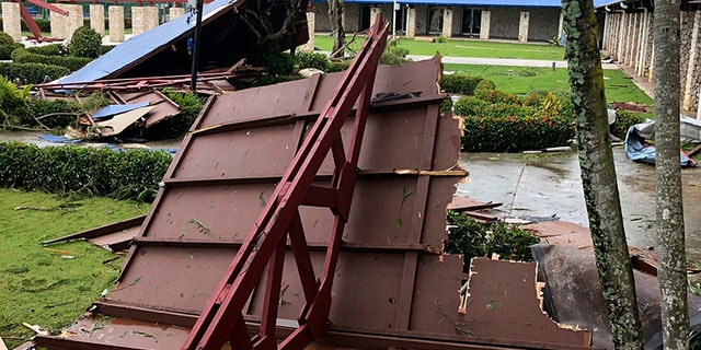 Debris is scattered after Super Typhoon Yutu hit the U.S. Commonwealth of the Northern Mariana Islands, Thursday in Garapan, Saipan. (AP Photo/Dean Sensui)