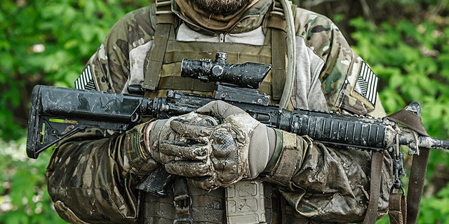 A Green Berets U.S. Army Special Forces Group soldier in action