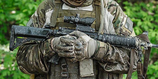 A Green Berets U.S. Army Special Forces Group soldier in action