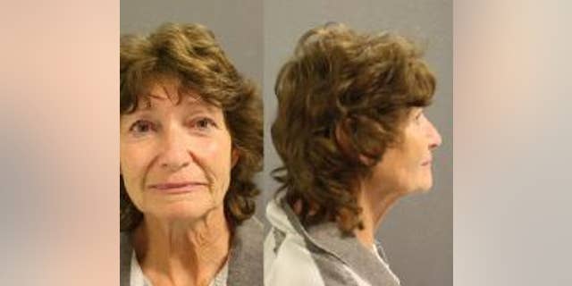 Linda Dwire, 64, was arrested on a harassment charge on Monday. She was captured on video in a verbal confrontation with another shopper defending two Spanish-speaking women.