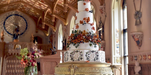 The wedding cake created by Sophie Cabot for the wedding of Princess Eugenie of York and Jack Brooksbank is seen at St George’s Hall, Windsor Castle, near London, England, Friday Oct. 12, 2018.