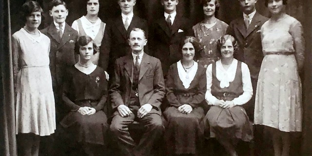 Henry Spall pictured front row in the photo with his son, Horace Henry Spall directly behind him. (Credit: SWNS)