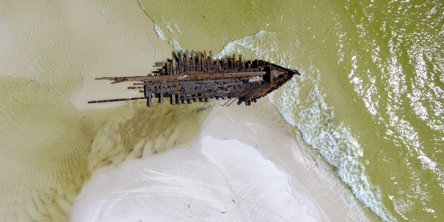 Smith took drone footage of the wreckage. The ships were destroyed during a hurricane in 1899.