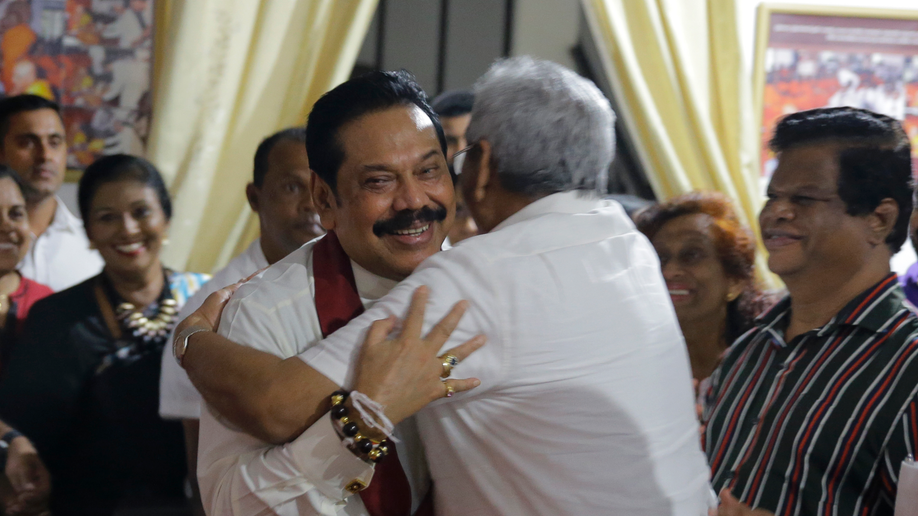 Former Sri Lankan president Rajapaksa becomes new PM amid political drama