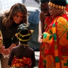 U.S. first lady Melania Trump greets a child during her visit at Cape Coast Castle, Ghana, October 3, 2018. REUTERS/Carlo Allegri