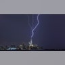 Lightning bolts strikes One World Trade Center during an electrical storm over New York City, Oct. 2, 2018.