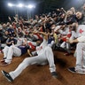 The Boston Red Sox pose for a picture after winning the American League Championship Series against the Houston Astros in Houston, Oct. 18, 2018.