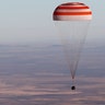 A Russian Soyuz MS-08 space capsule lands south-east of Dzhezkazgan, Kazakhstan, Oct. 4, 2018. 